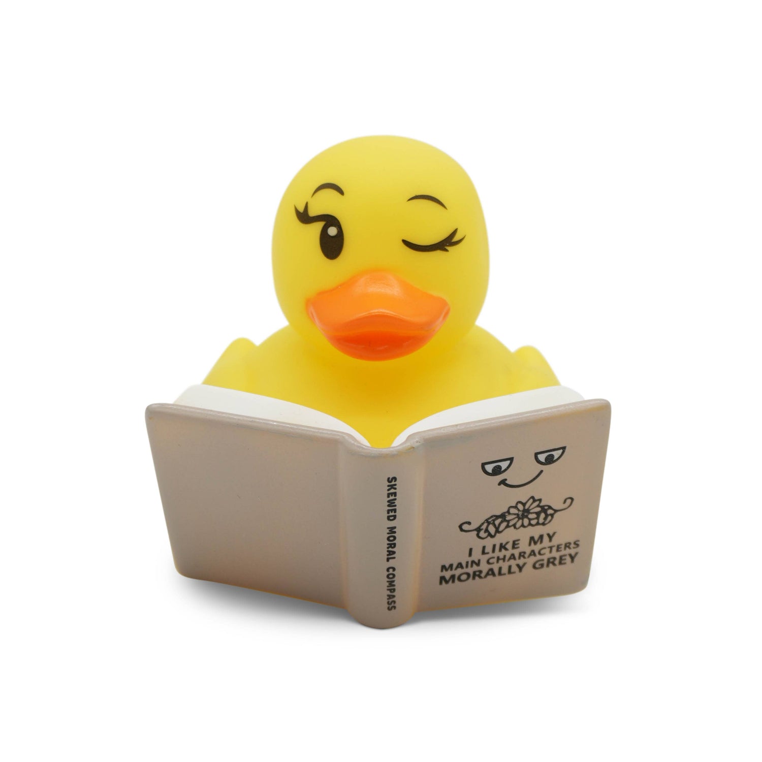 Yellow rubber duck reading a book with text on a white background