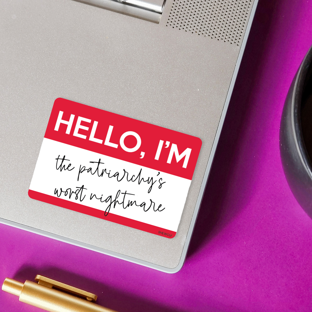 Notebook with a sticker reading &