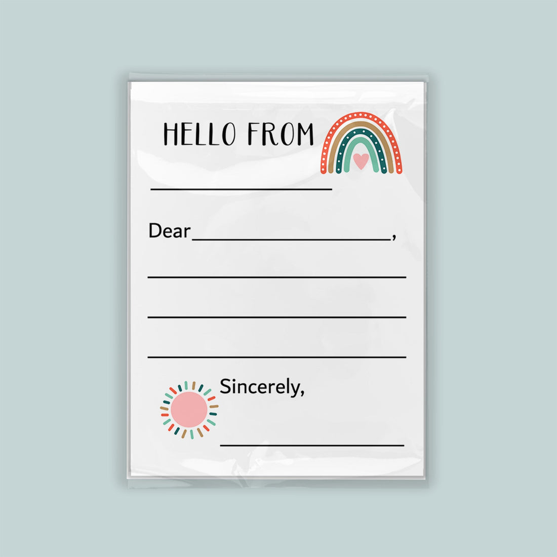 The image is a blank letterhead with a rainbow graphic and a heart symbol, inviting the recipient to write a message.