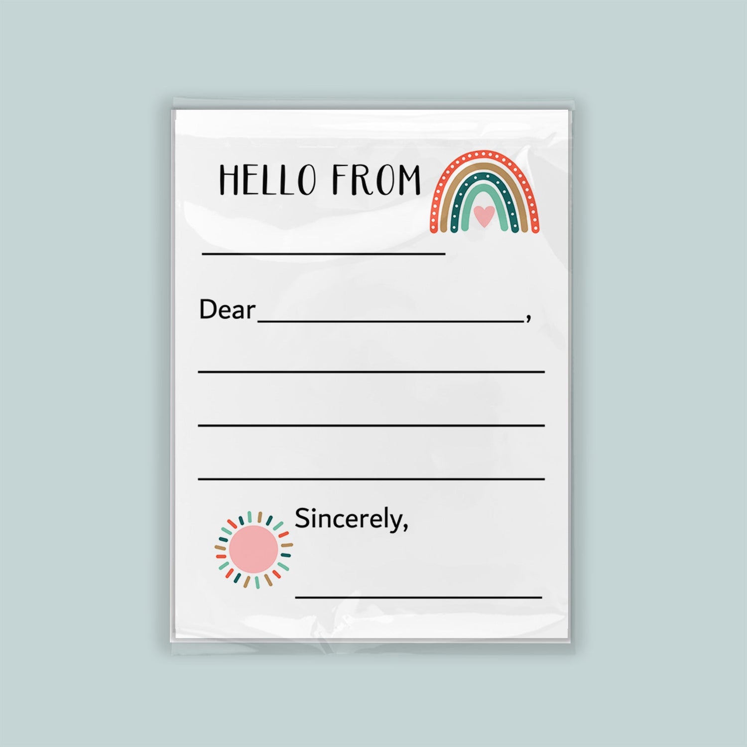 The image is a blank letterhead with a rainbow graphic and a heart symbol, inviting the recipient to write a message.