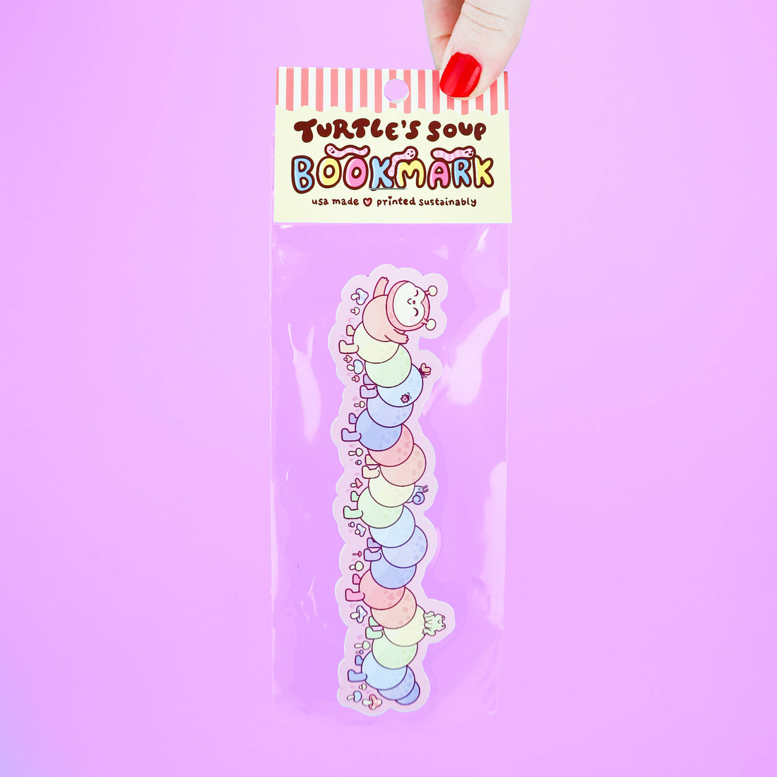 Colorful caterpillar bookmark in packaging with &