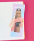 Bookmark with cartoon character and tassel on a pink background