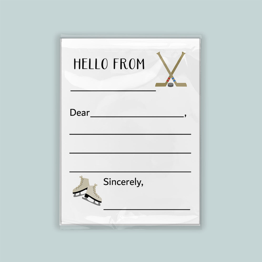 The image is a white envelope with a hockey stick and skates on the front, along with a blank greeting card space for a message.
