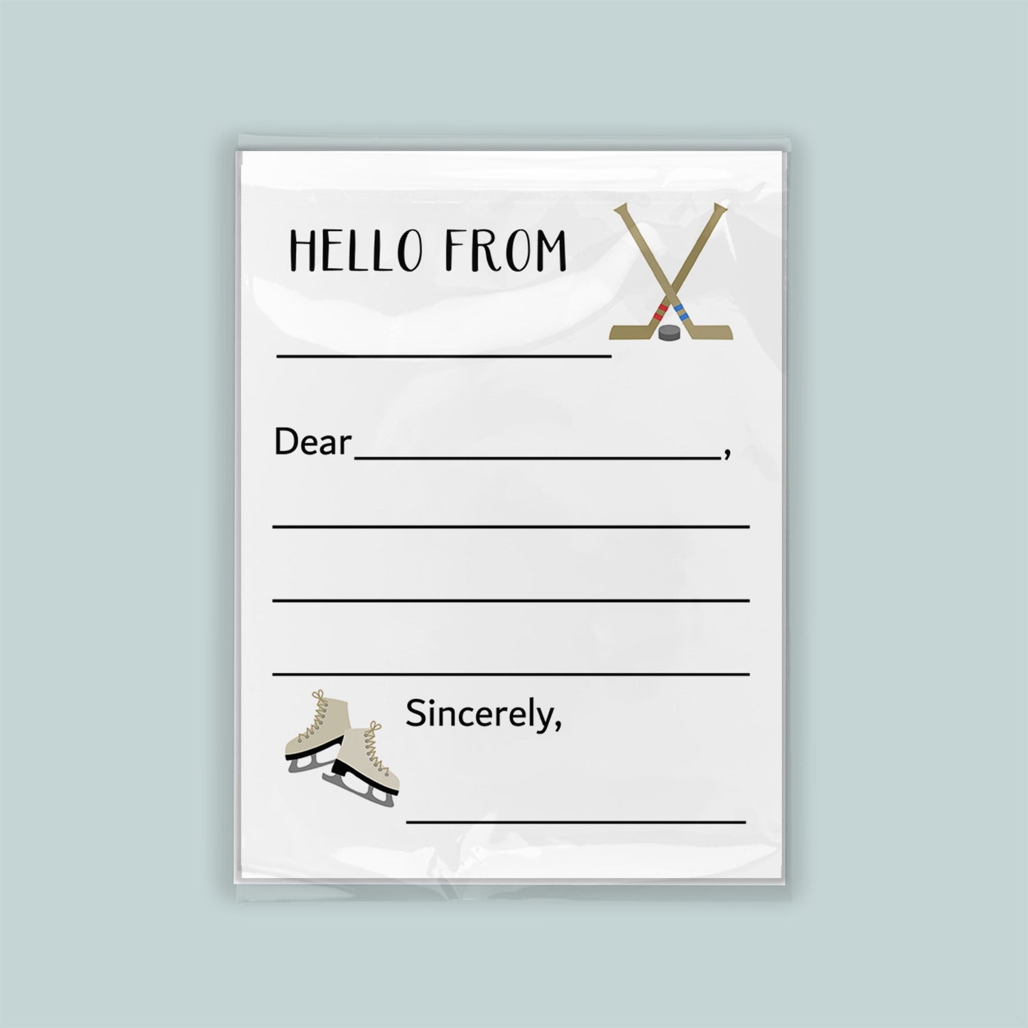 The image is a white envelope with a hockey stick and skates on the front, along with a blank greeting card space for a message.