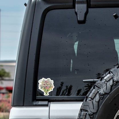 Car window with a sticker on a vehicle outdoors