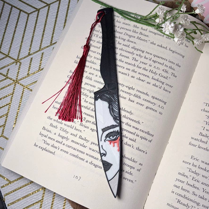 Bookmark with tassel on an open book