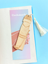 Bookmark with a cartoon character on a colorful background