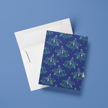 blue card with floral Jewish Star pattern against a green background