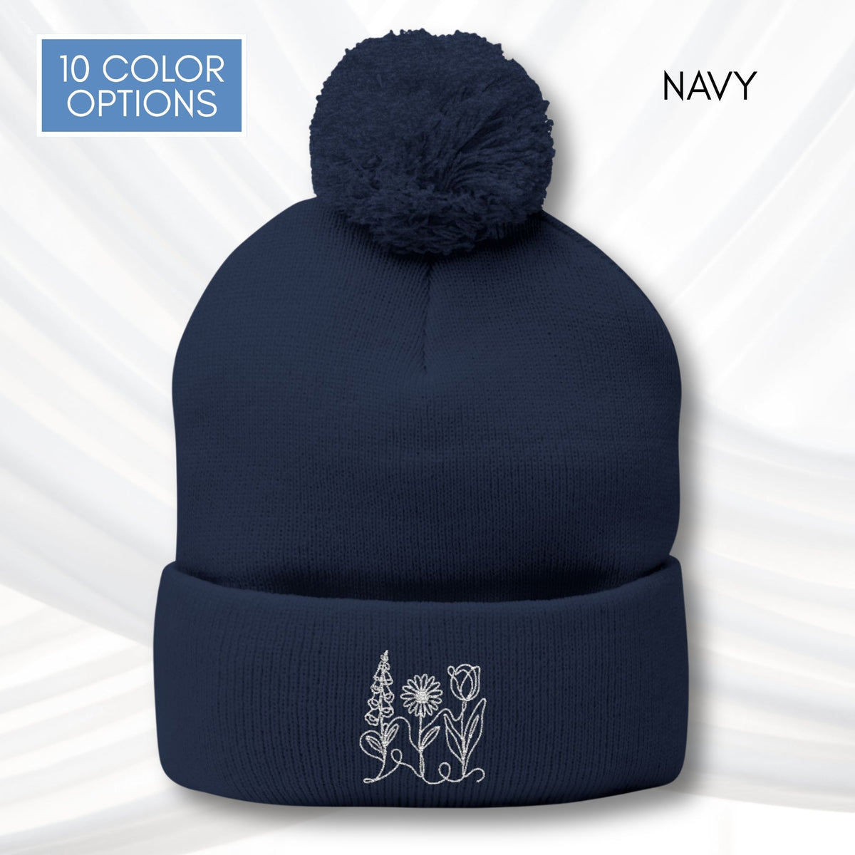 foxglove-daisy-tulip-pom-pom-knit-cap-embroidered-subtle-fdt-flowers-winter-hat-beanie-navy