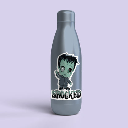 Chibi Frankenstein monster sticker on a gray insulated water bottle