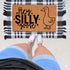 Hey Silly Goose Doormat on front porch with layered rug
