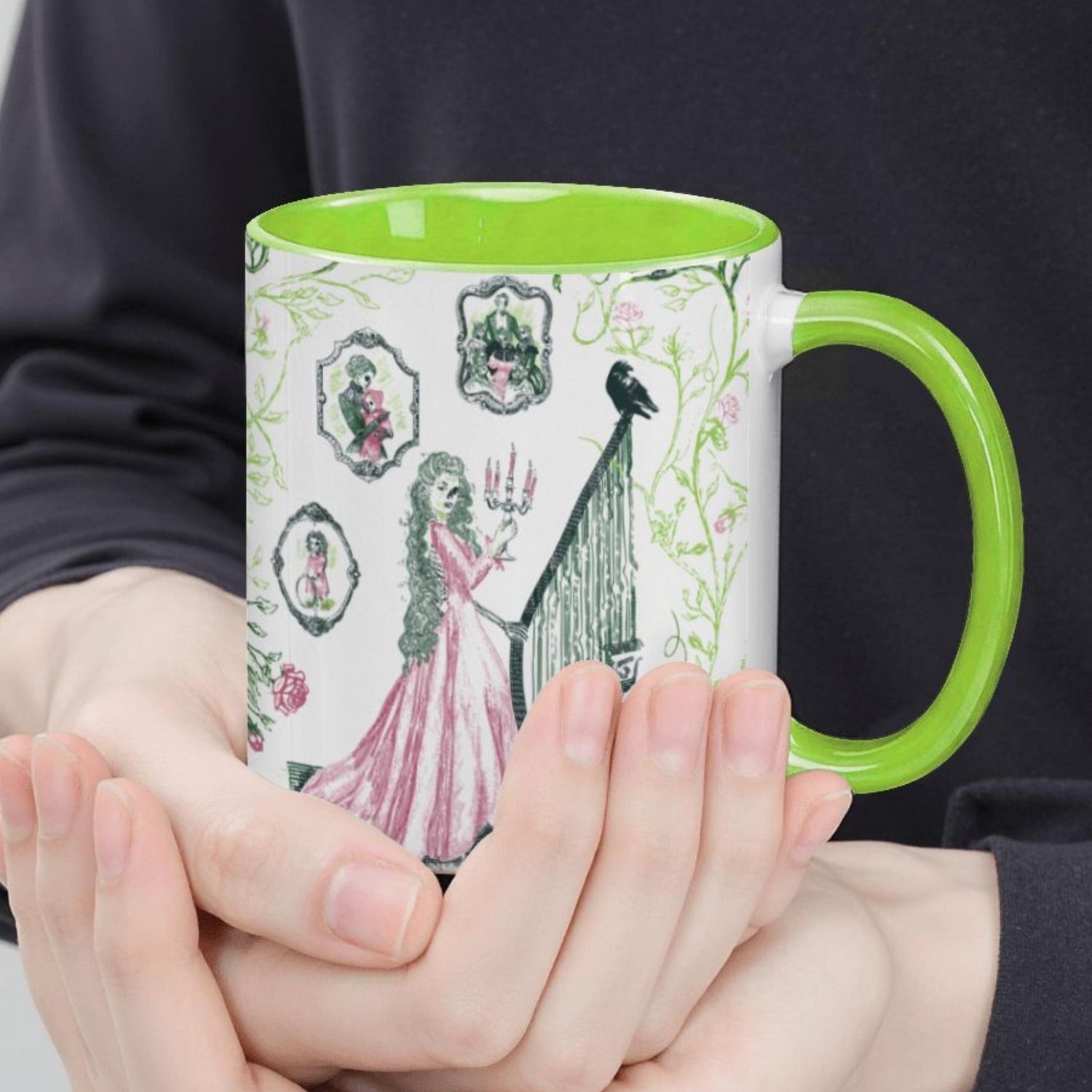 Hands holding a spring green preppy gothic toile mug with a green-skinned Victorian woman