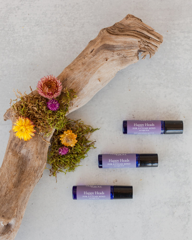Fig &amp; Grove Happy Heads natural head tension roller bottle — lavender and peppermint essential oil roller for head pressure and drowsiness relief, handmade in Copperopolis California, no synthetic ingredients