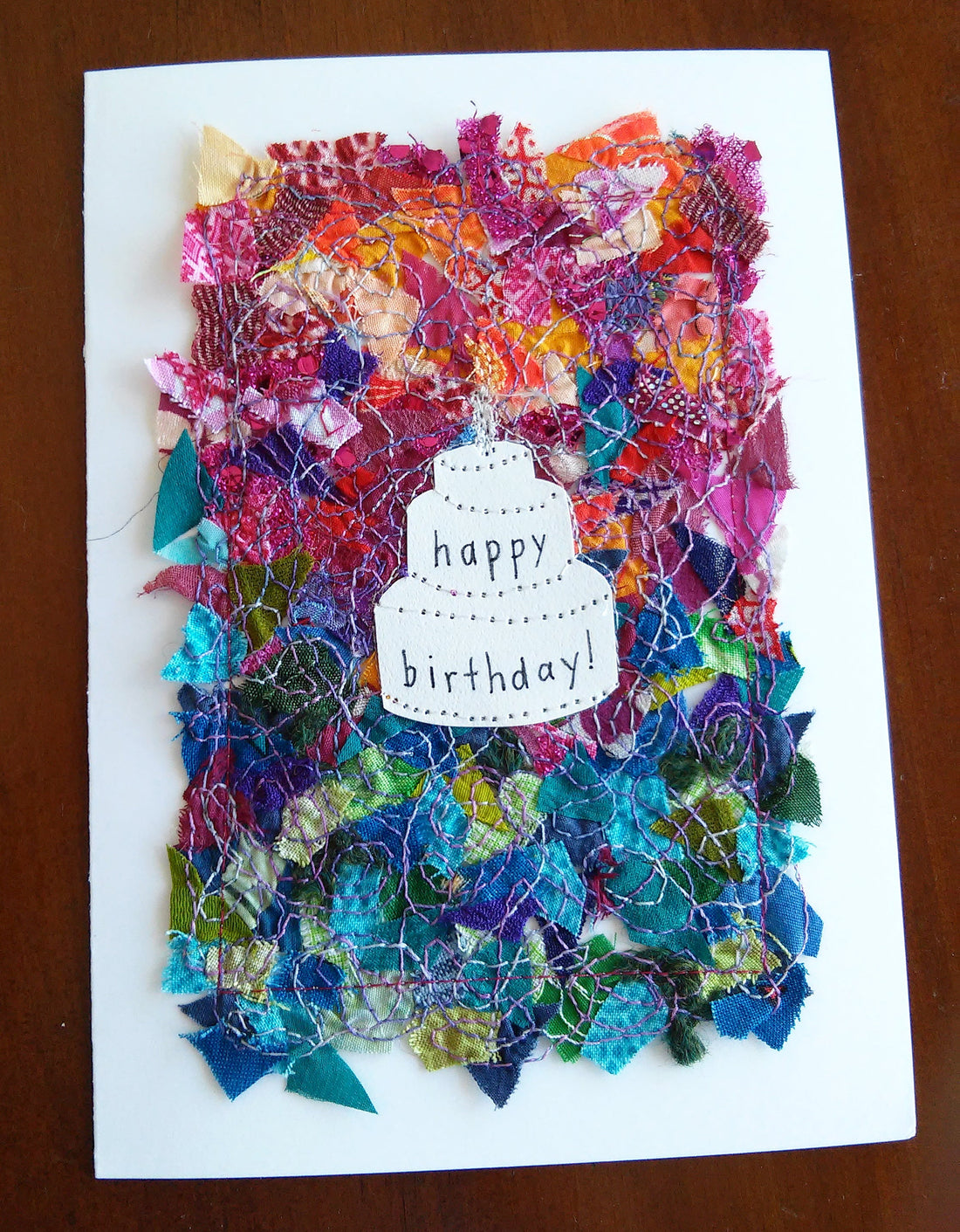 Birthday cake card: 5" x 7", multicolored fabric collage on white, blank inside, with matching envelope