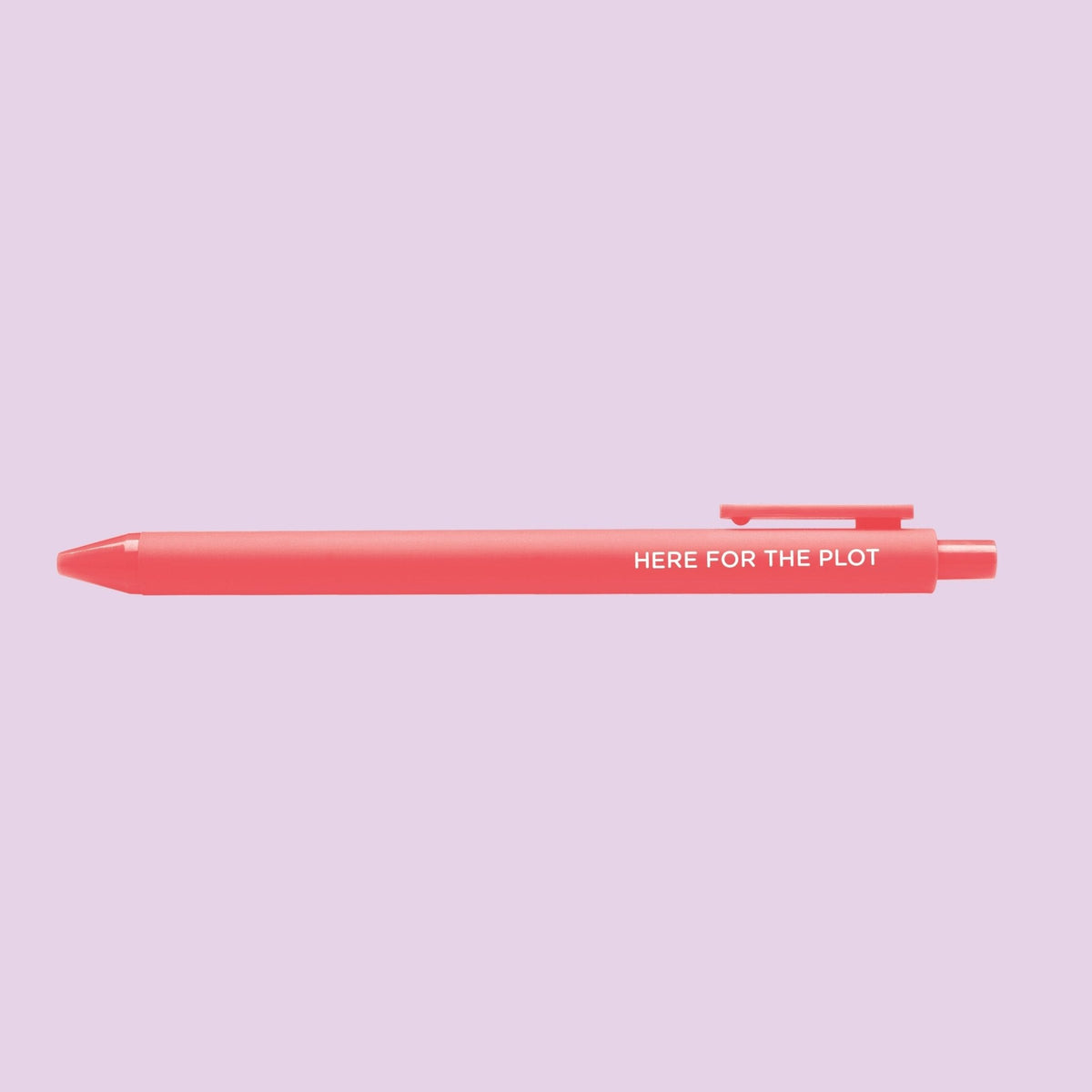 Here For the Plot pen — book lover stationery pen in neon coral with printed white lettering by indie artist MangoIllustrated