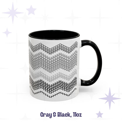 Front view of the Gray and Black 11oz hidden message mug with black handle and interior, showing the four-band chevron embroidery pattern, labeled &