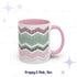 Front view of the Preppy and Pink 11oz hidden message mug with pink handle and interior showing the four-band chevron embroidery pattern, labeled &