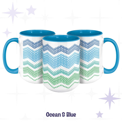 Three Ocean &amp; Blue hidden message accent mugs arranged together, wrap-around typographic wave pattern transitioning from navy through teal to green on white ceramic
