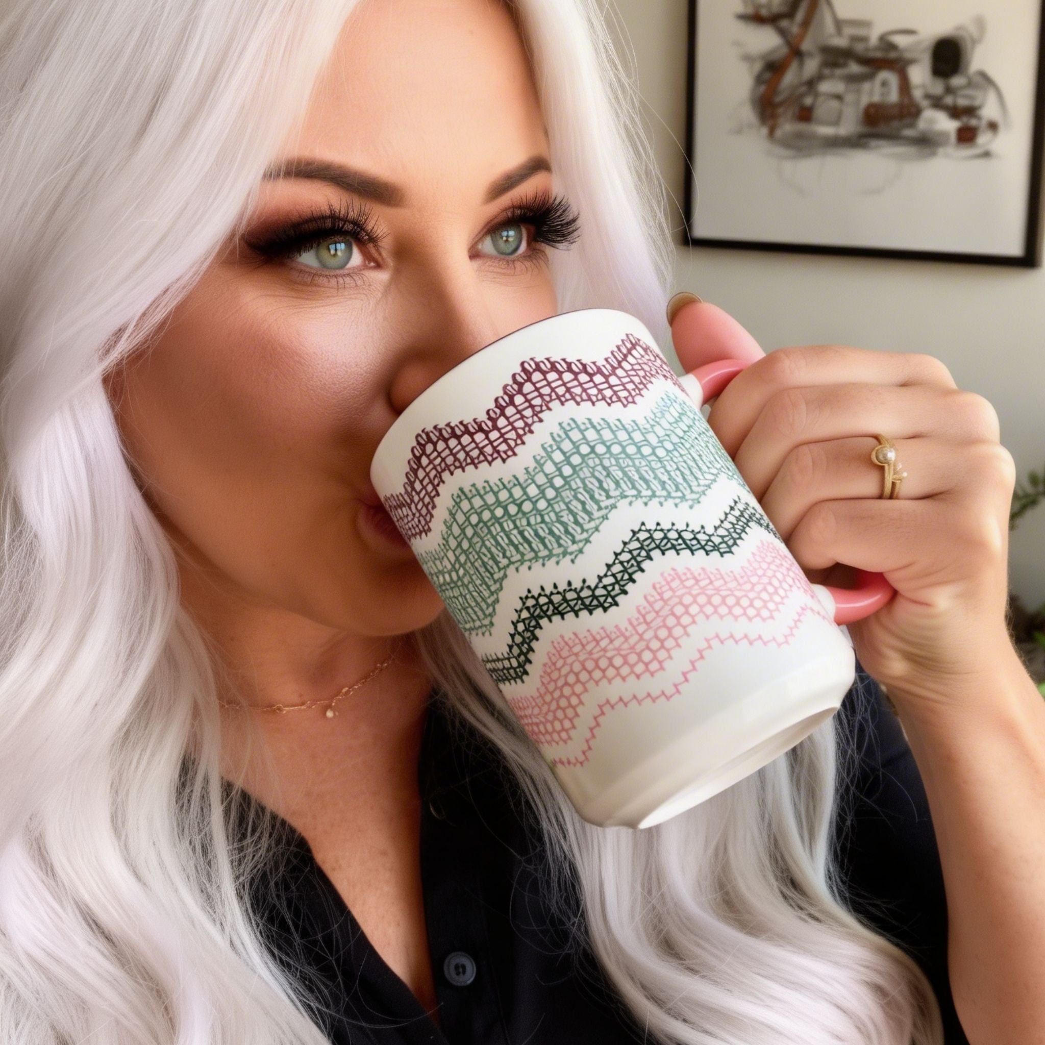 White-haired woman drinking from Preppy &amp; Pink hidden message mug — close portrait showing the burgundy, green, and pink fair isle typography pattern on the ceramic