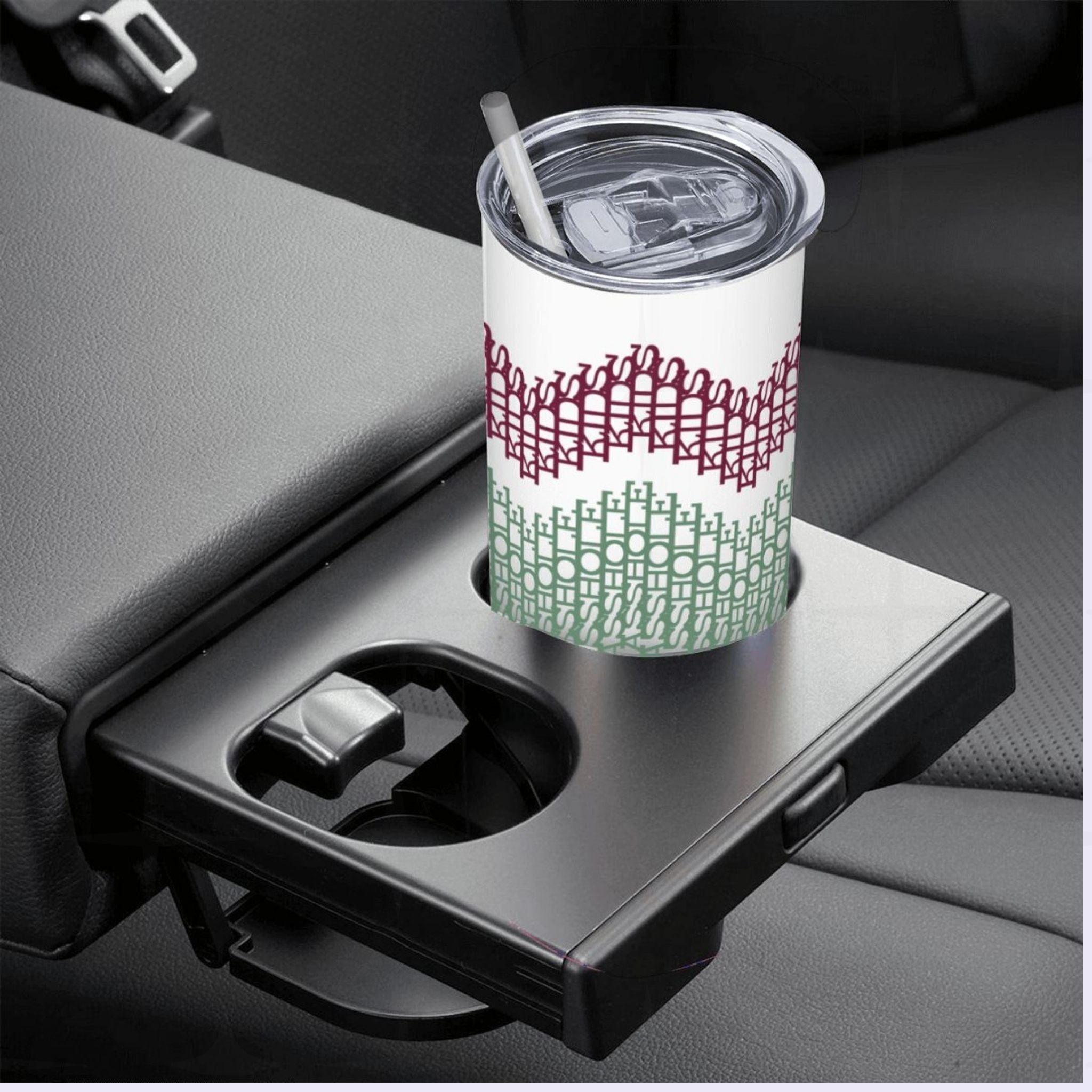 Hidden message skinny tumbler with straw in a car cupholder, preppy stripes colorway — burgundy and sage green embroidery-pattern stripe bands visible on white stainless steel body