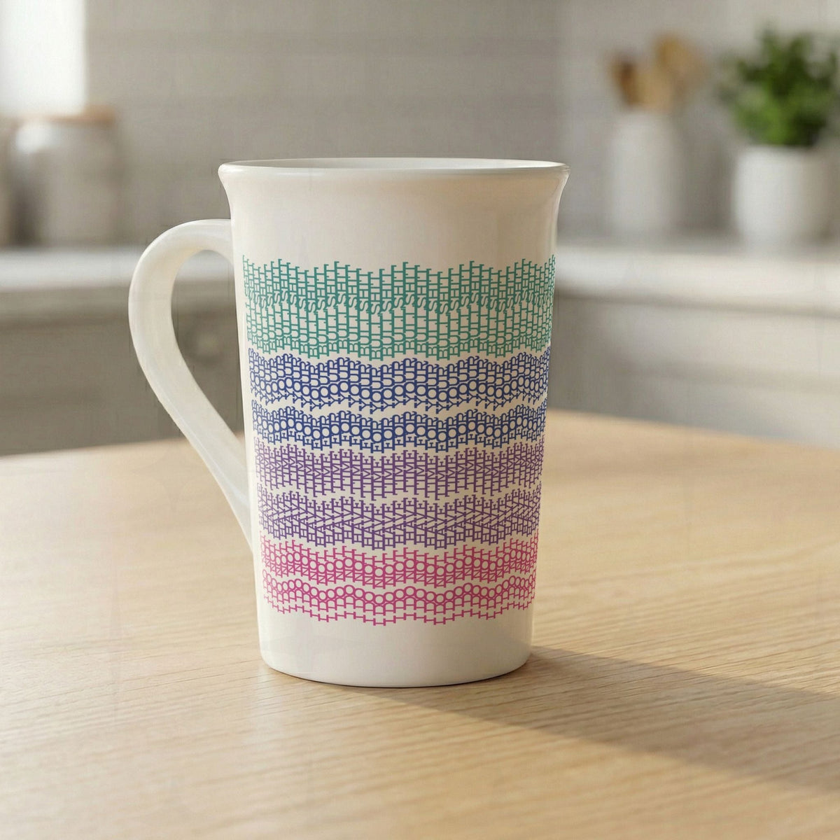 Bright stripes hidden profanity latte mug without lid on wooden kitchen counter, teal blue purple pink ombre knit stitch swear word pattern on 16oz ceramic
