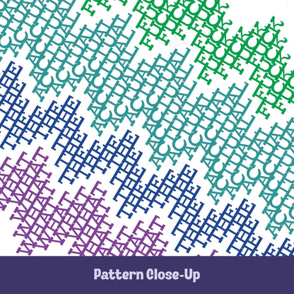 Close-up of hidden swear word pattern on latte mug in bright stripes colorway, geometric letterforms in green teal blue and purple revealing WHAT THE ACTUAL FUCK text