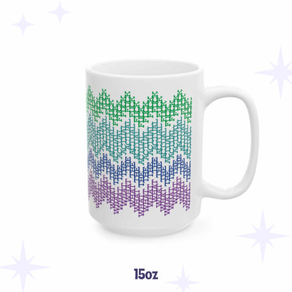 White ceramic hidden message mug, What the Actual F*ck, with colorful fair isle zigzag pattern in green, teal, blue, and purple 15 oz