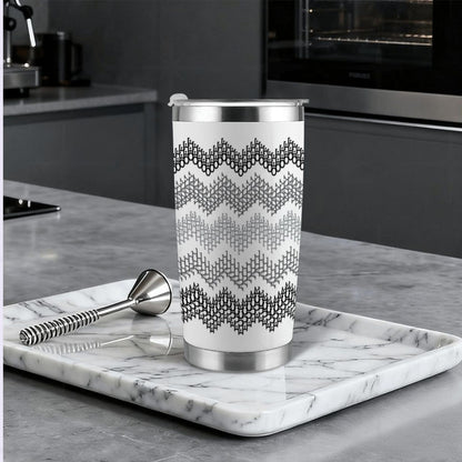 Gray stripe hidden profanity tumbler on marble tray in modern kitchen with cocktail bar spoon and stainless steel straw