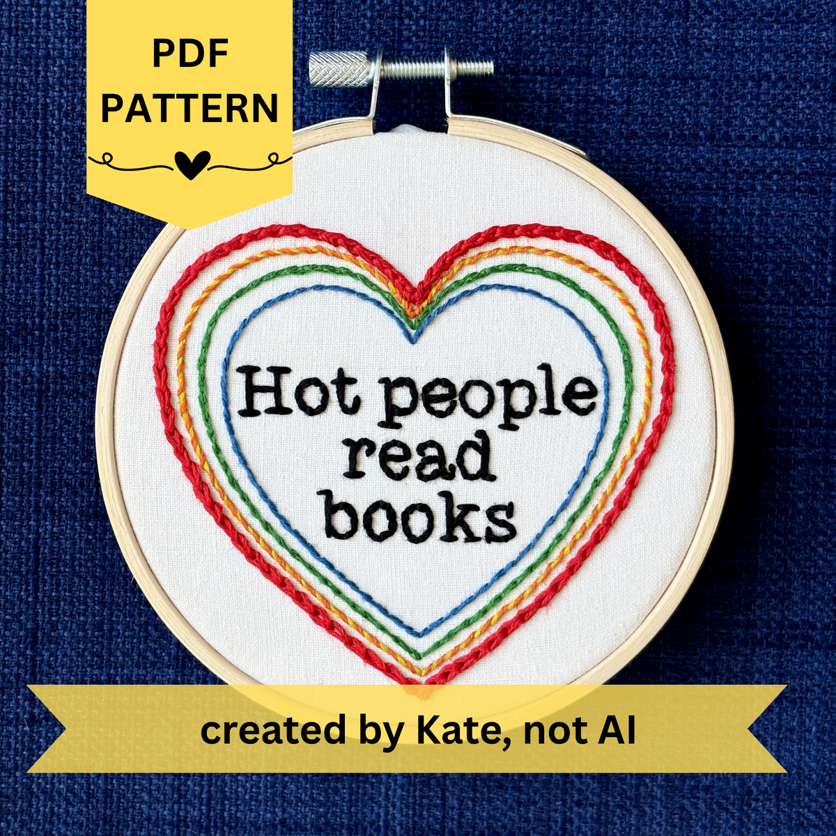 PDF pattern created by Kate, not AI. "Hot people read books" Quote hand embroidered in black embroidery thread in a serif, typewriter font. Text is framed in a series of hearts nested inside of each other and sewn in rainbow colors. Each heart is stitched in a different hand embroidery stitch, as a sampler. Fabric is white cotton. Displayed as wall art in a light wooden embroidery hoop. Also sized for a christmas ornament.