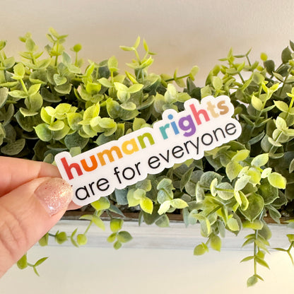 Hand holding a colorful &