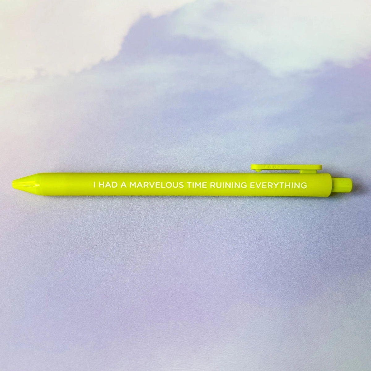I had a marvelous time ruining everything jotter gel pen flat lay — citron barrel folklore era desk pen by indie artist MangoIllustrated
