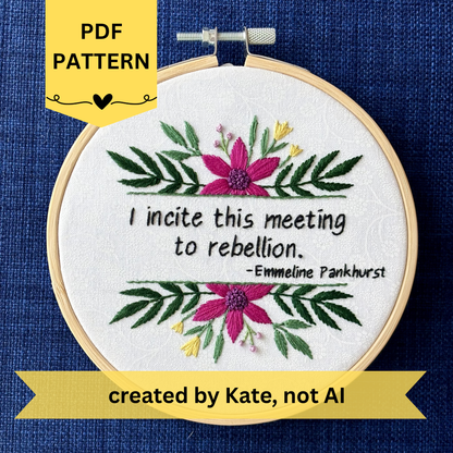 PDF pattern created by Kate, not AI. "I incite this meeting to rebellion - Emmeline Pankhurst". Quote hand embroidered in black thread. Framed with a fuchsia daisies, small yellow tulips, sprigs of green leaves, and branches with lavender flower buds. Hand sewn on white-on-white cotton and displayed as wall art in a light wooden embroidery hoop.