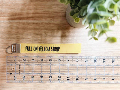 Pull on Yellow Strap Embroidered Wristlet | Handmade Disney Theme Park-Inspired Keychain