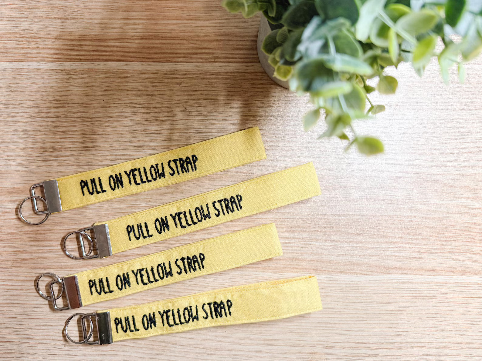 Pull on Yellow Strap Embroidered Wristlet | Handmade Disney Theme Park-Inspired Keychain