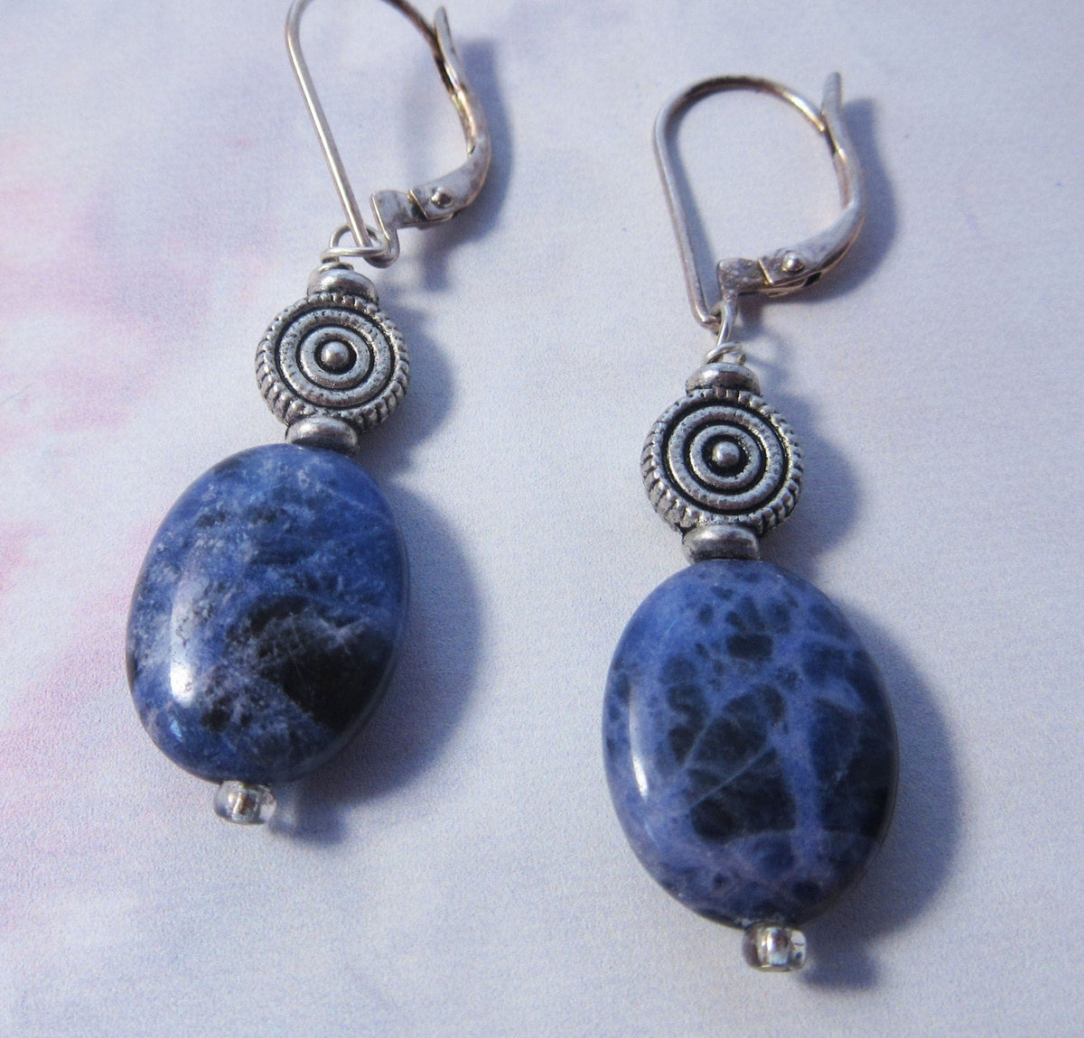 Sodalite earrings - artisan-designed denim blue stone and spiral earrings, perfect gift for creativity and self-expression.