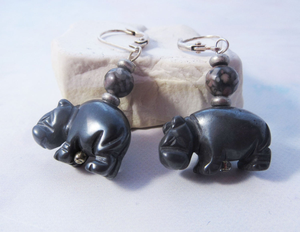 Hippo earrings featuring carved hematite hippos, a stunning piece of hippopotamus jewelry.