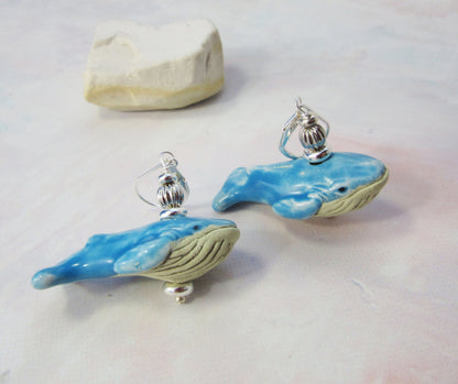 Close-up of hand-painted Whale Earrings Big Blue, showcasing intricate details and vibrant colors, ideal for ocean-themed accessories.