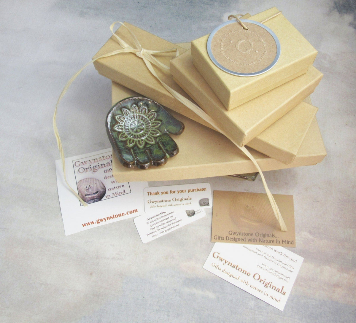 Eye Catching Gift - Shimmering Bead Handed Magnifier being used to examine a small print, a thoughtful gift for anyone needing magnification.