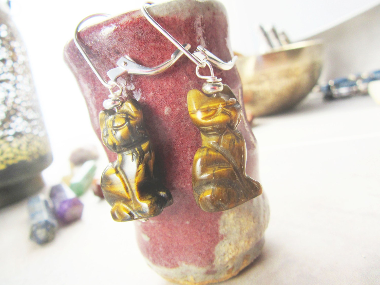 Cat Lover Earrings displayed on a model, featuring the unique sitting cat design on sterling silver lever backs.