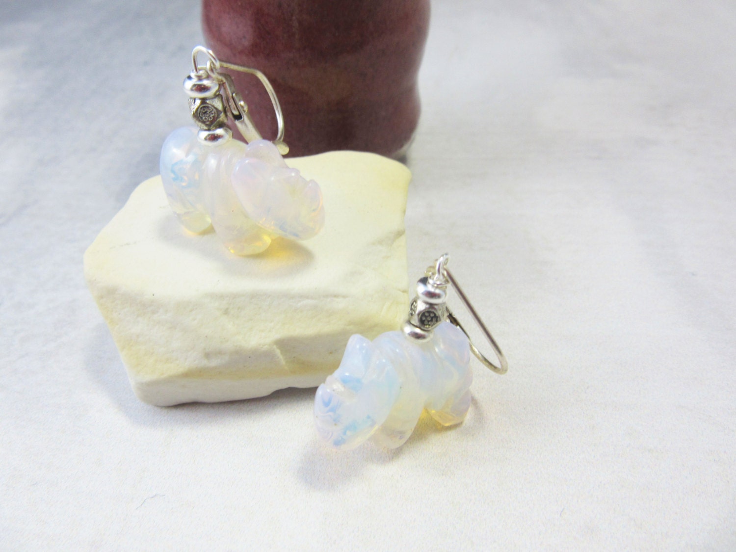White Rhino Earrings by Enlivenadorn - Exotic jewelry featuring opalescent stones, perfect gift for endangered animal supporters.