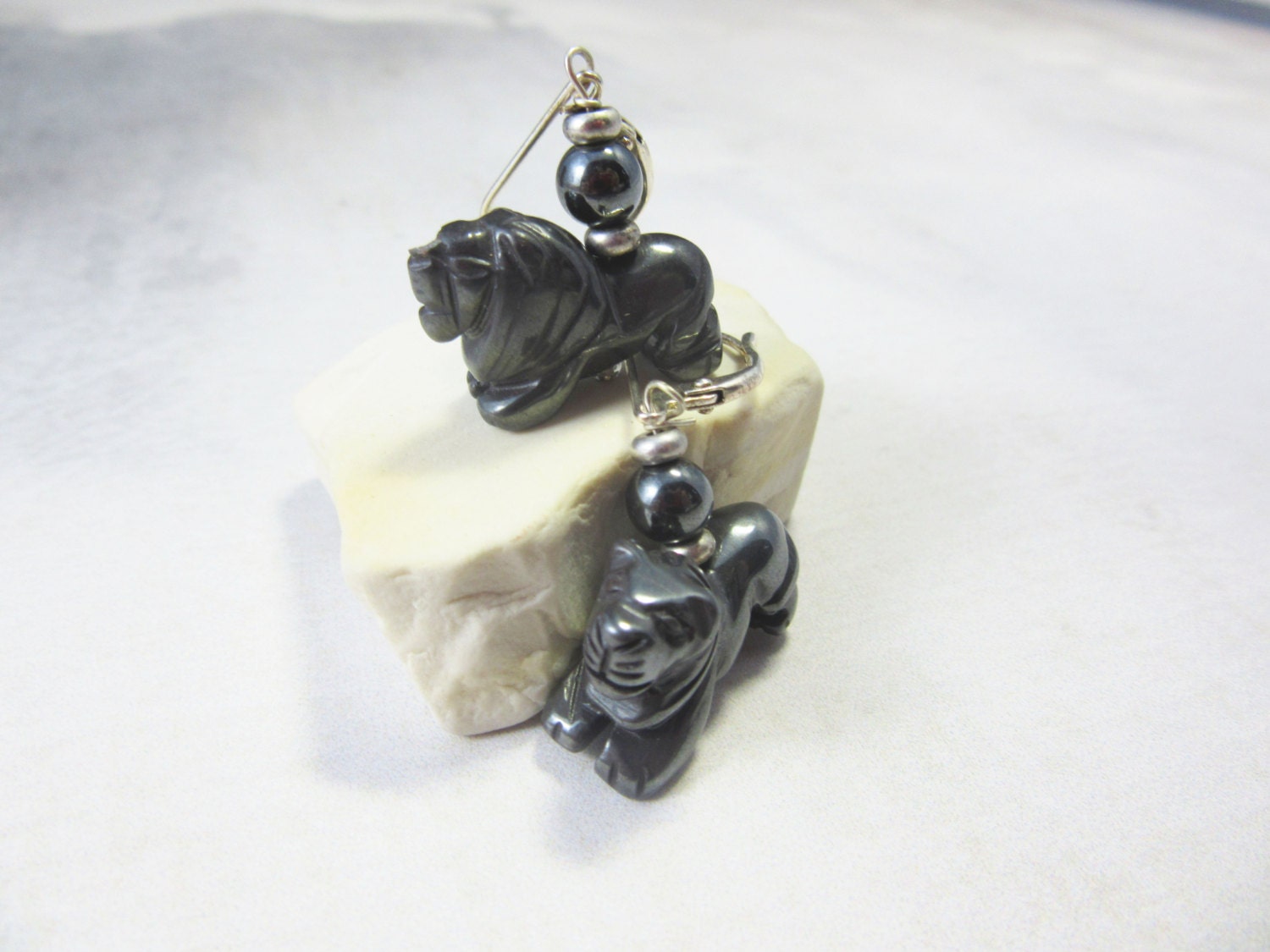 Lion Earrings, Carved Hematite Earrings showcasing intricate lion designs, perfect for animal lovers and zoo enthusiasts.