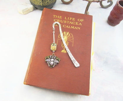 Close-up of the honey bee bookmark - metal bookmark in bronze and silver, beautifully crafted as a thoughtful gift for nature lovers.