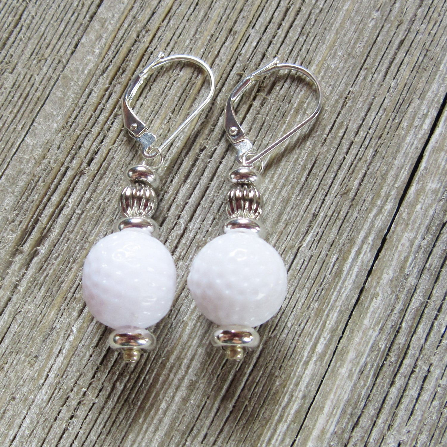 Golf Earrings a Gift for Woman Golfer, displayed on a white background showcasing the fun golf ball theme.