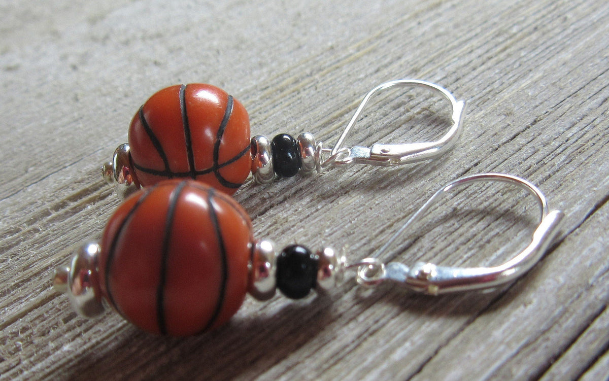 Basketball novelty earrings showcasing a basketball-themed design, perfect for sports girl enthusiasts and March Madness fans.