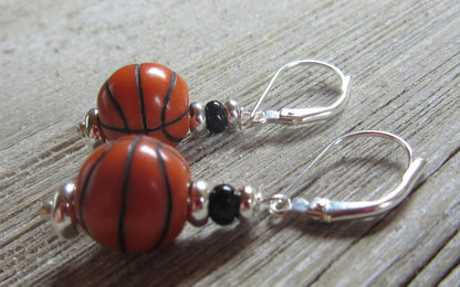 Basketball novelty earrings showcasing a basketball-themed design, perfect for sports girl enthusiasts and March Madness fans.