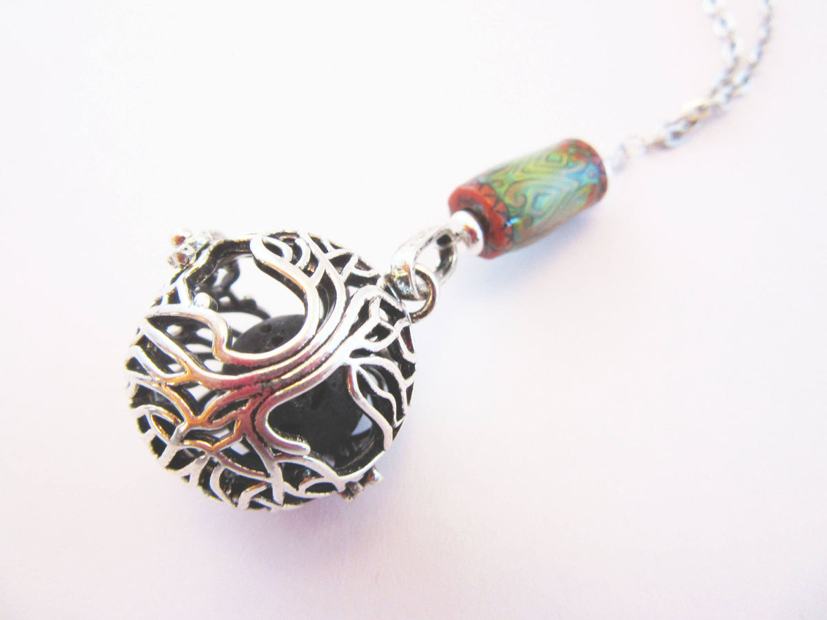 Elegant display of COLOR CHANGING essential oil jewelry, featuring a versatile aromatherapy essential oils diffuser necklace perfect for yoga and meditation practices.
