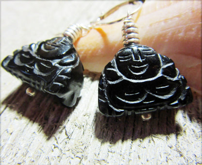 Close-up view of Smiling Buddha Laughing Earrings, made from black stone, embodying tranquility and peaceful energy.