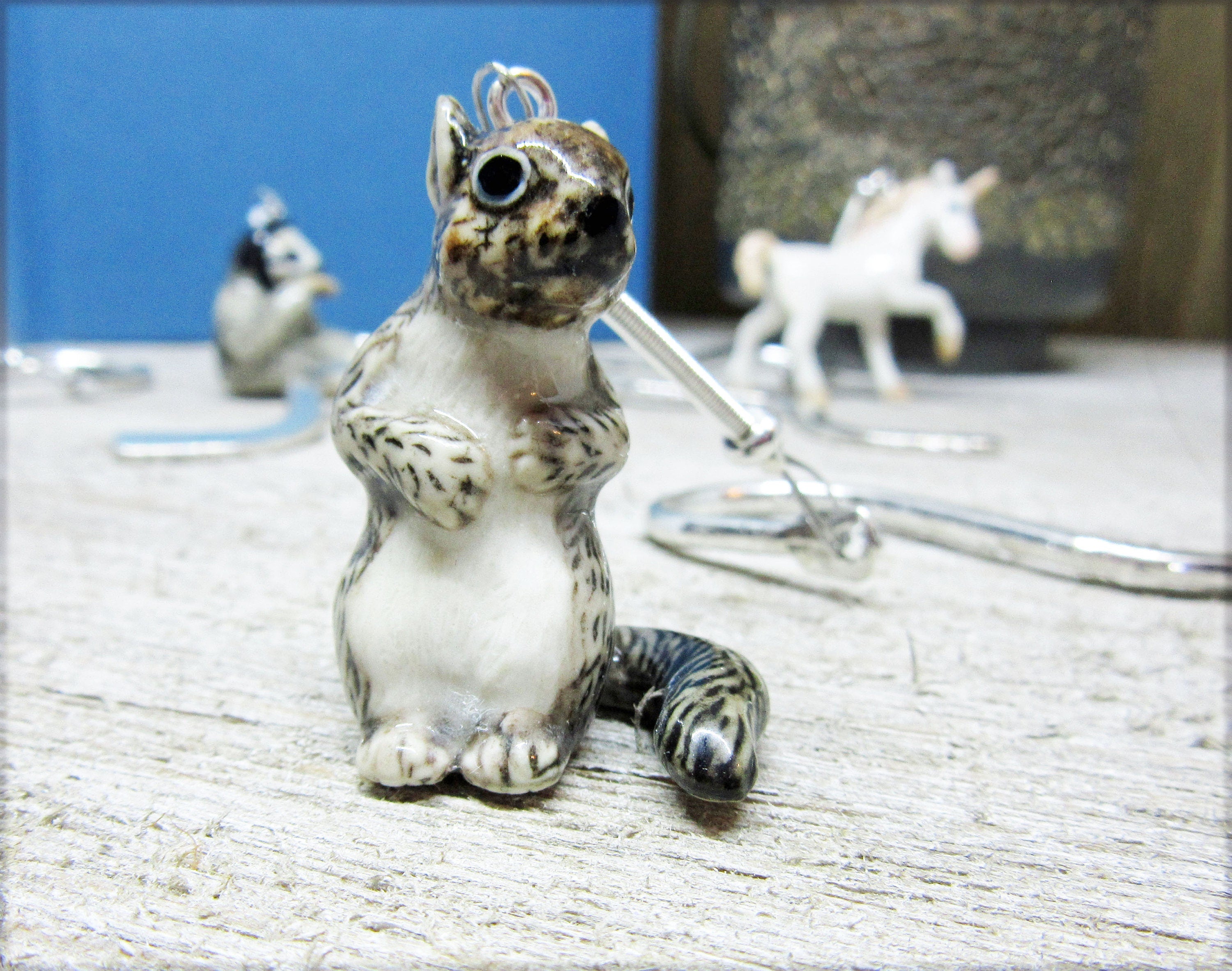 Squirrel Bookmark - delicate porcelain gray squirrel detail on a silver squiggly stick, perfect gift for squirrel lovers and readers.