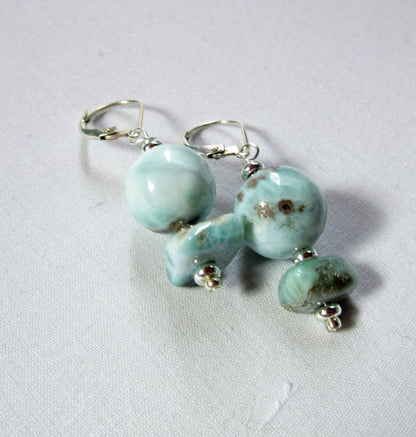 Close-up of Larimar Earrings showcasing stunning sky blue colors, handcrafted Dominican jewelry for the beach lover, ideal gift.