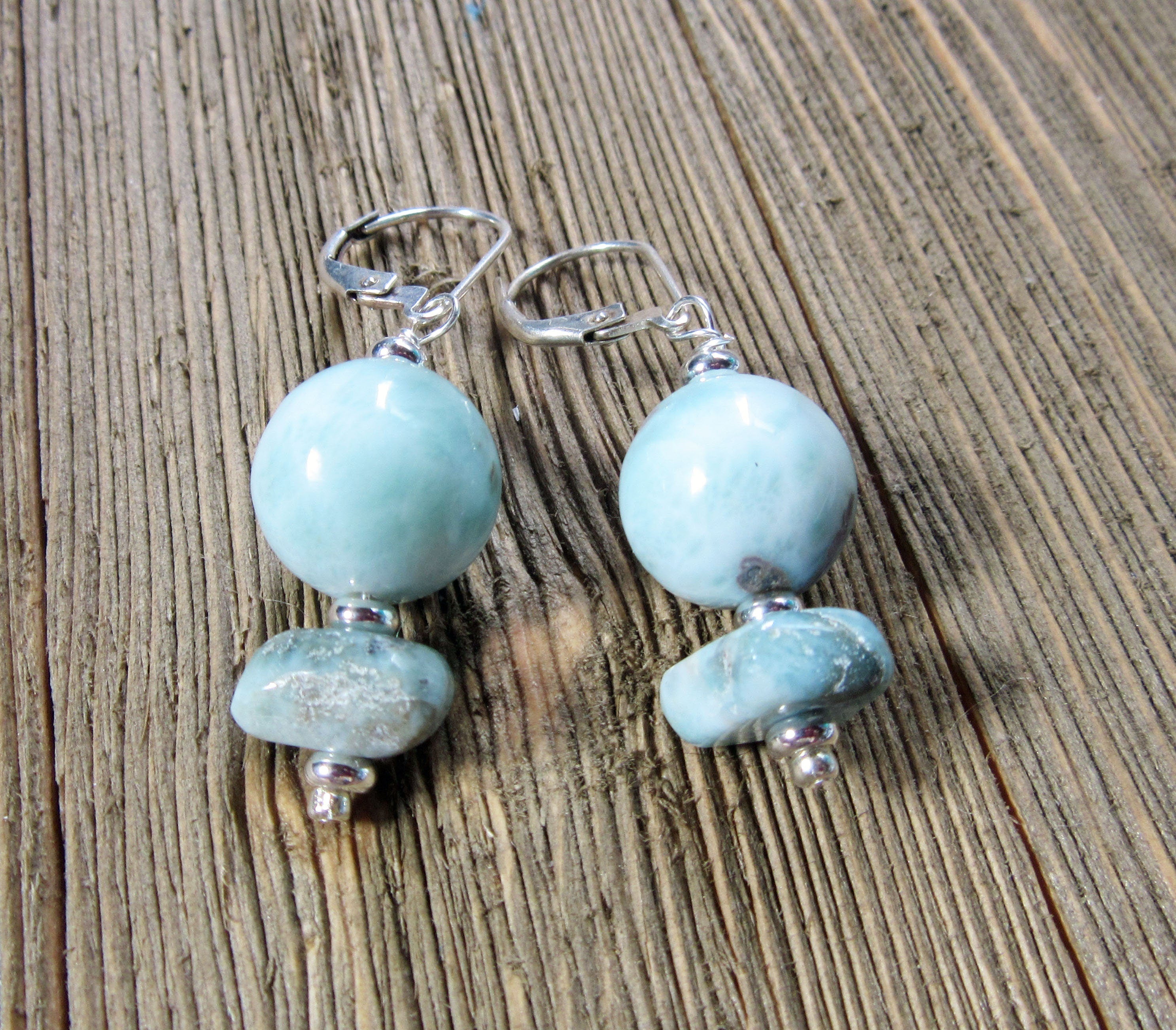 Elegant Larimar Earrings in Boho style, made from genuine sky blue Larimar stone, perfect for a serene tropical getaway.